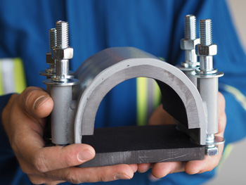 DamperX pipe clamp to reduce and dampen vibration